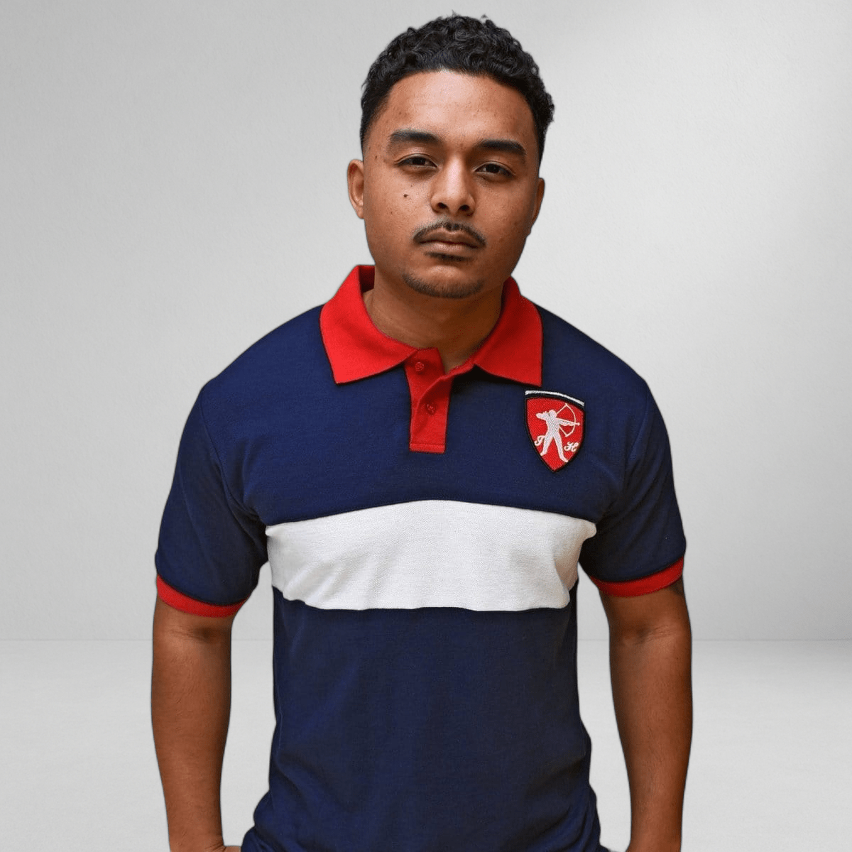 Marksmen Piqué Cotton Polo – Navy / Red Collar - J.HINTON
