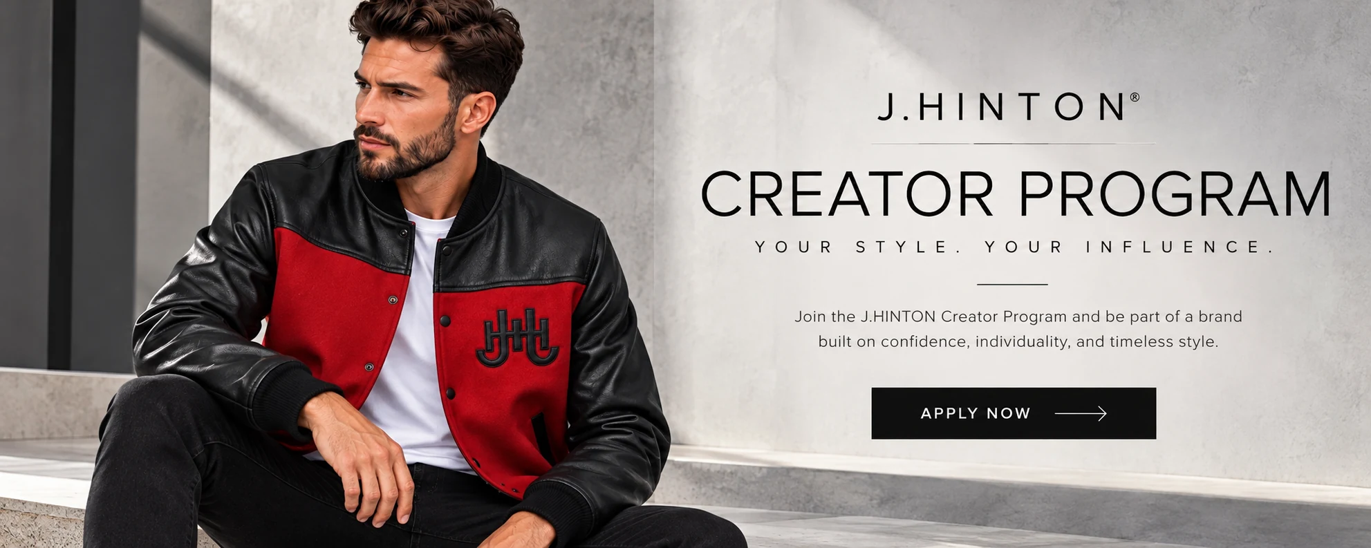 J.HINTON Creator Program — Your style. Your influence. Model wearing the red and black J.HINTON varsity jacket. Apply now.