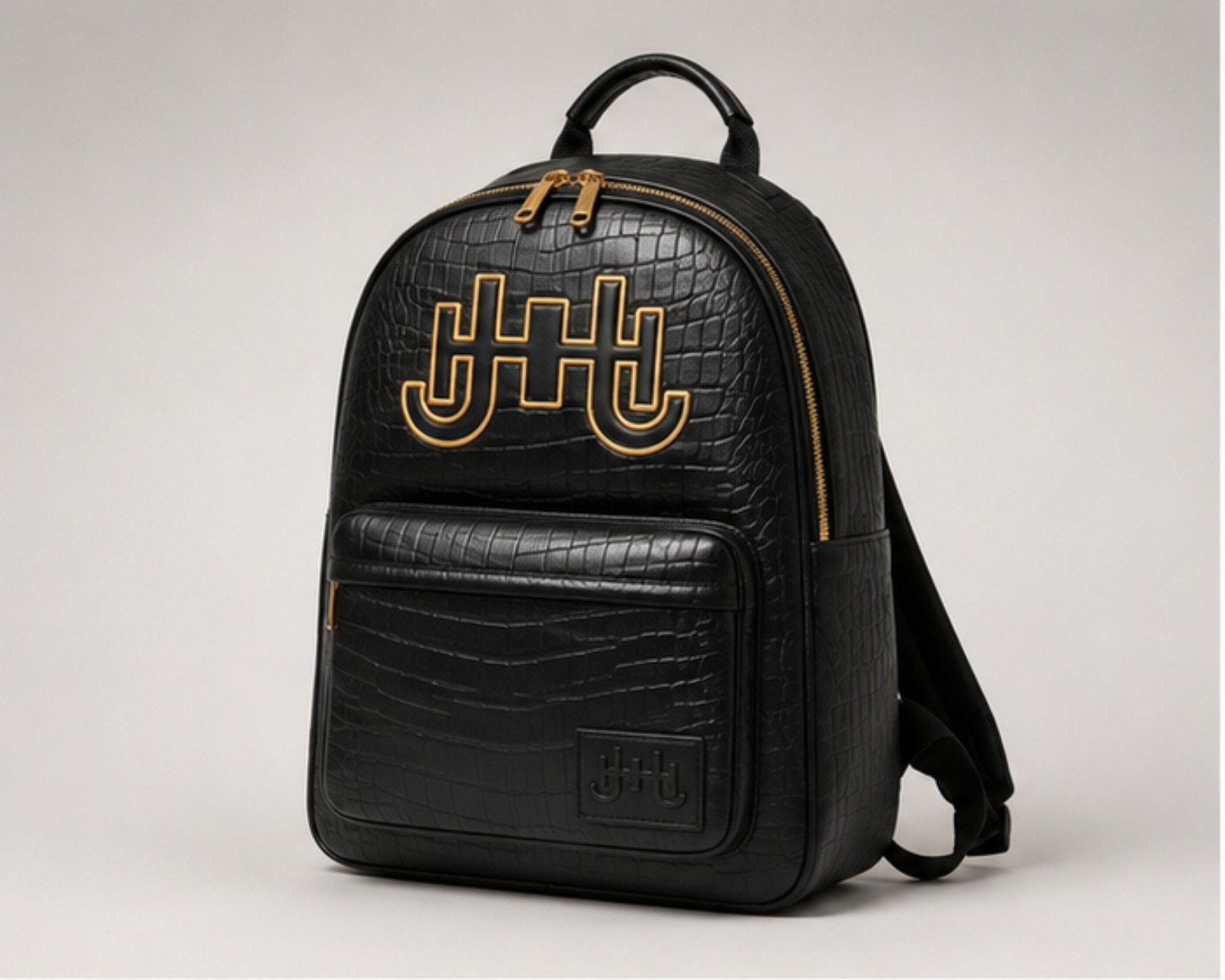 The Camden Backpack — Noir Gold angle view